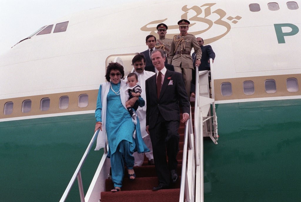 benazir bhutto the prime minister of pakistan carries a child as she leads d8f42b 1024 benazir bhutto the prime minister of pakistan carries a child as she leads d8f42b 1024