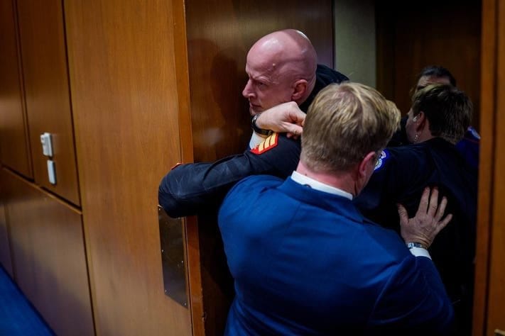Brian McGinnis Removed From Hearing After Shouting Incident