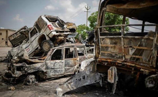 Burnt vehicles are pictured following clashes between Hindus and Muslims in Nuh district of the northern state of Haryana, In